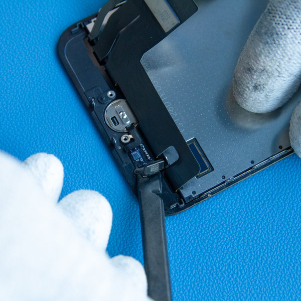 Odłączenie złącza przycisku Home