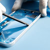 Przyklej nową taśmę klejącą wokół krawędzi iPhone’a #1